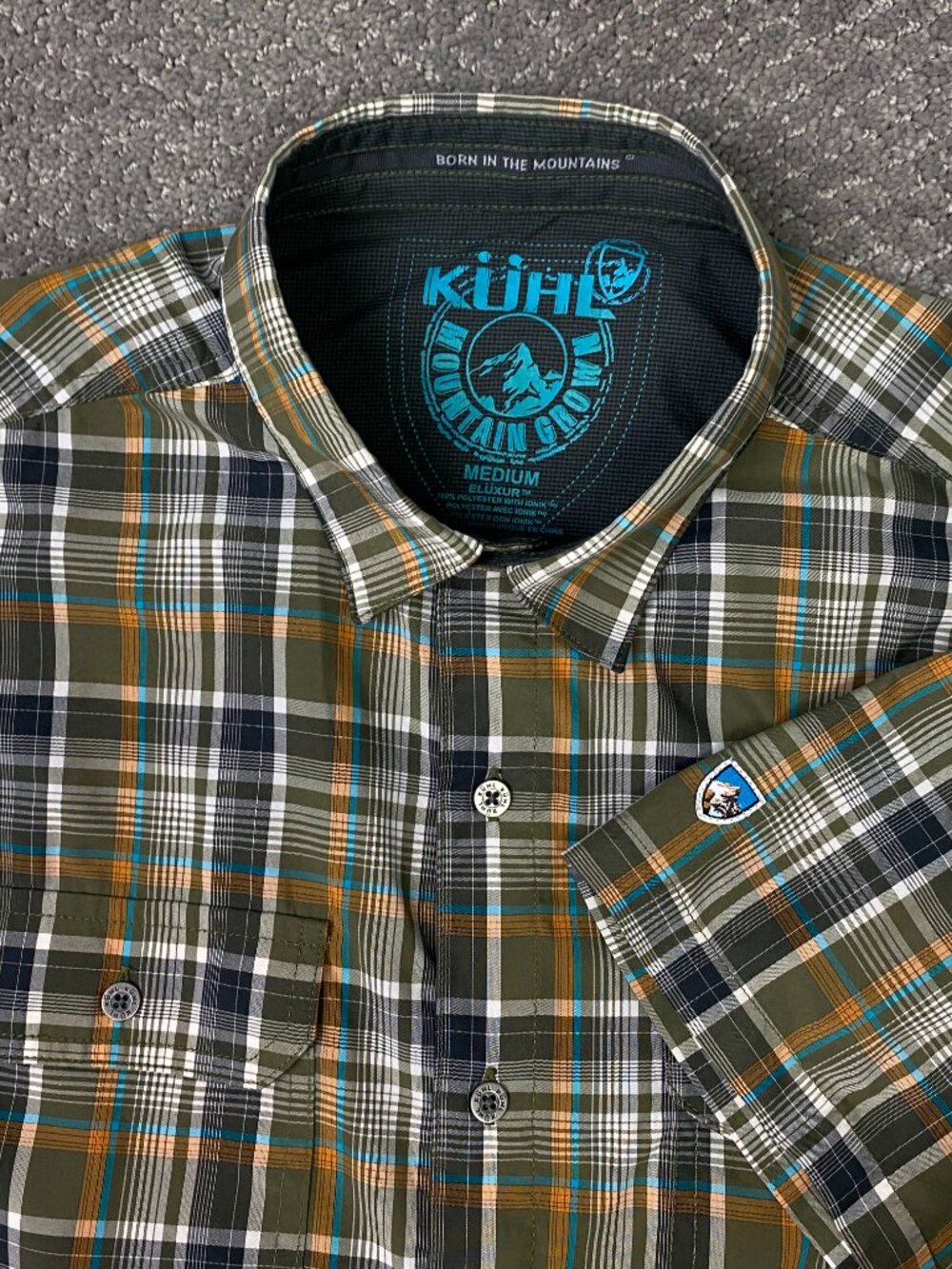 Kuhl Eluxur Shirt Mens Medium Green Orange Turquoise Plaid Short Sleeve Ionik